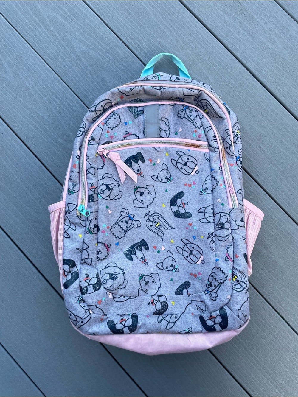 Target backpack, gray/pink/blue, rainbow zipper, 16x12. Used.
